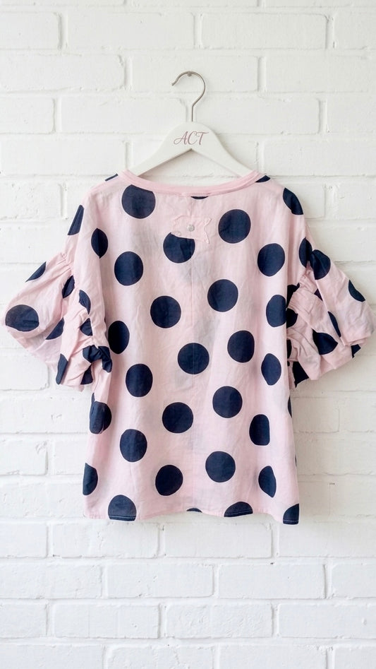 Blusa de topos con manga farol