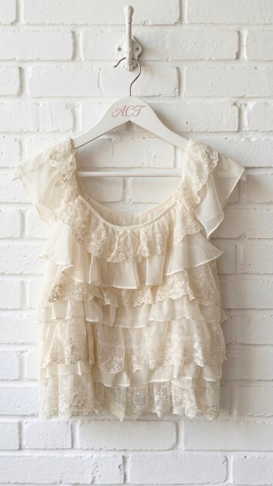 Blusa de encaje con volantes