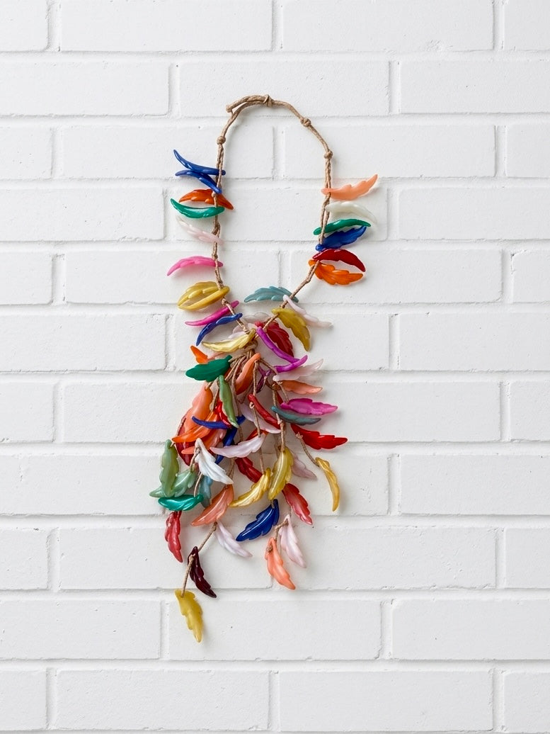 Collar cascada plumas