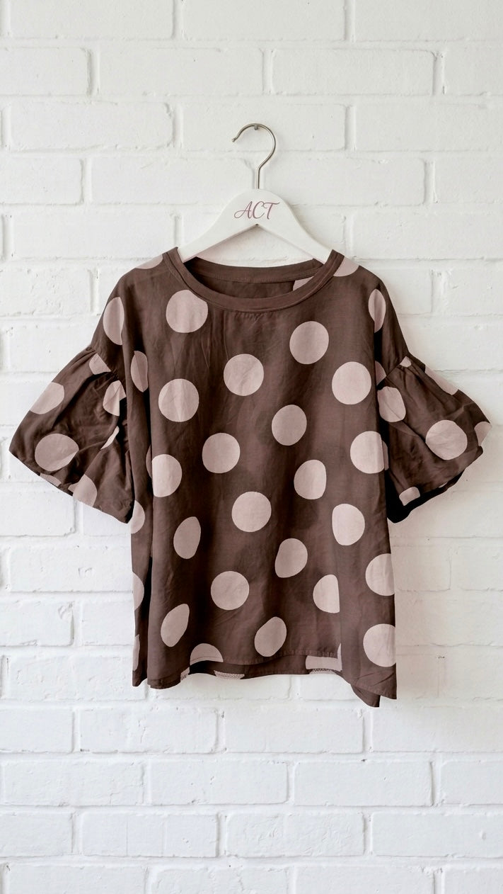 Blusa de topos con manga farol