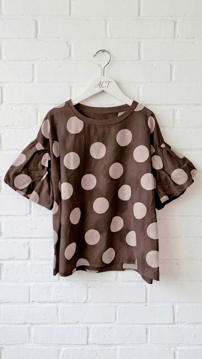 Blusa de topos con manga farol